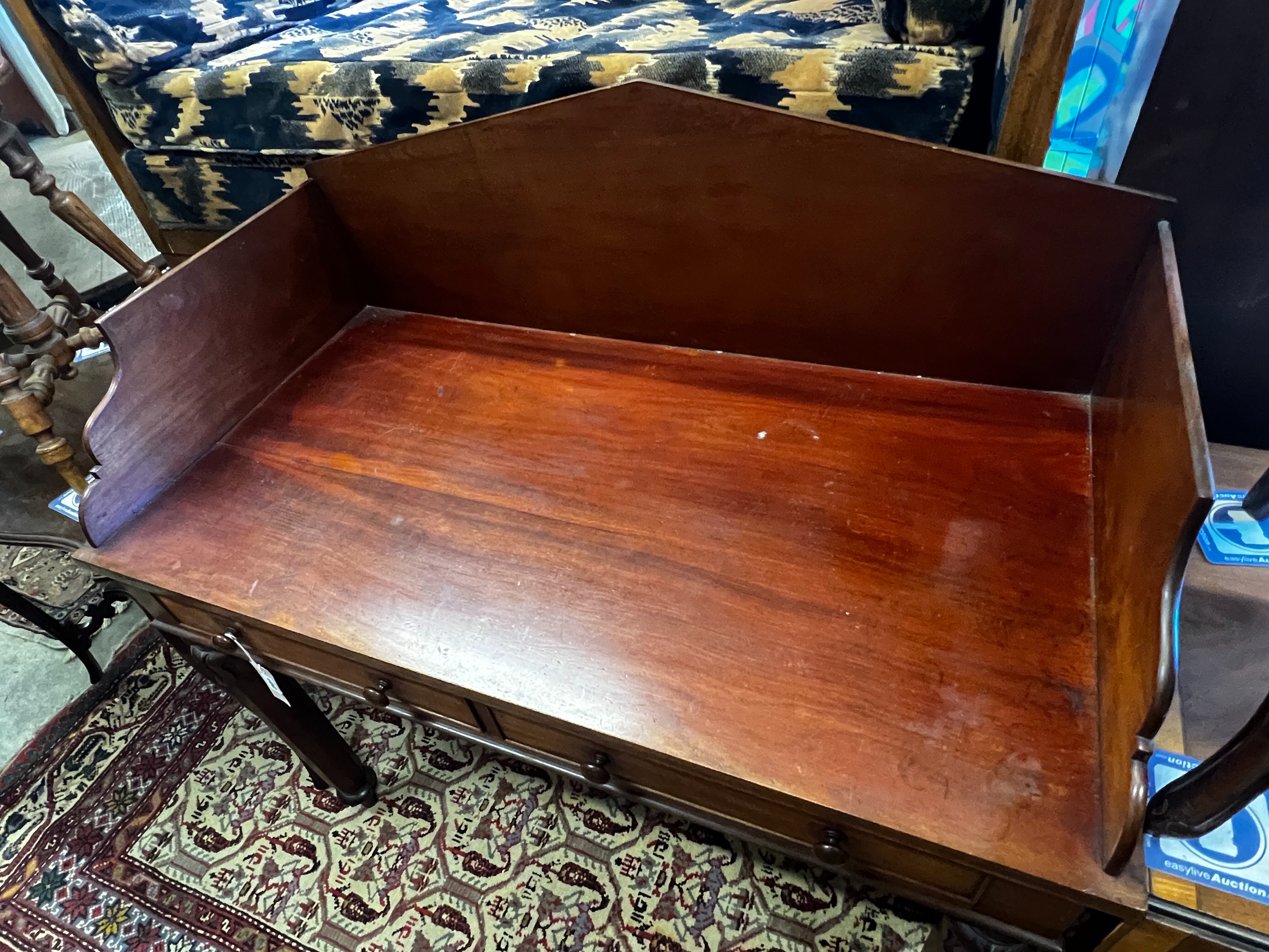 An early Victorian mahogany washstand, width 107cm, depth 56cm, height 109cm